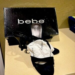 Strappy, dressy black 4” satin heels by Bebe. Size 9